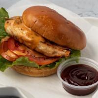 Chicken Breast Sandwich · Grilled or fried. Served with lettuce, tomatoes and slobber sauce on toasted brioche bun. Se...
