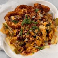 Hot Mess · Fries, fritos, onion rings chili, cheese, bacon, jalapenos, slobber sauce.