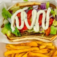 Lamb Gyro Combo · Served with onions, tomatoes, lettuce and tzatziki sauce on pita bread.