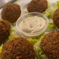 Falafel (6) · Fried spiced balls of ground chickpeas.