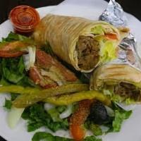 Beef Shawarma Platter · Grilled seasoned meat cut into thin slices with tahini sauce. (all platters come with arabic...