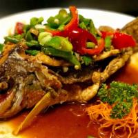 Hot & Spicy Fish · Hot. Crispy, whole snapper (1 1/2 lb) or fresh fish fillet topped with a delicious red chili...
