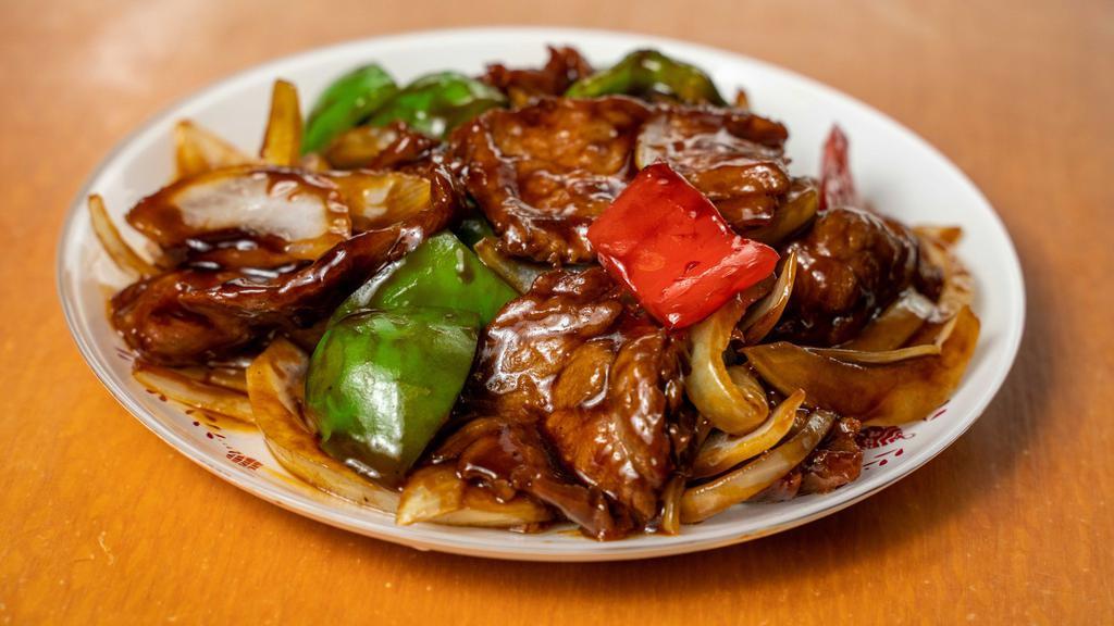Pepper Steak With Onions · Sautéed beef with green pepper and onion in brown sauce. served with steamed white rice.