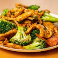 Chicken With Broccoli · Served with steamed white rice.