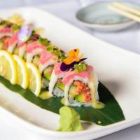 Taki Taki Roll
 · Spicy tuna, cucumber, avocado, jalapeno, yuzu miso, and topped with tuna tataki.