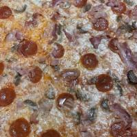 Meat Lover · Tomato sauce, mozzarella, pepperoni, smoked bacon, ham, and Italian sausage.