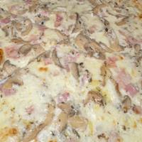 Black Truffle · Mozzarella, black truffle cream, ham, mushrooms, and white truffle oil.