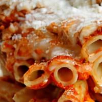 Baked Ziti · Parmesan cheese, fresh ricotta, mozzarella cheese, and spice atop ziti noodles. Toasted with...