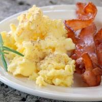 2 Eggs Combo · Scrambled, fried or omelet, bacon or jam, Cuban toast or hash brown potatoes, coffee 8 oz.