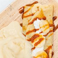 Buenos Aires Crepe · Dulce de leche, banana, whipped cream, vanilla ice cream.