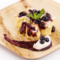 Sydney · Cheesecake crepe - cheesecake cream, red berry reduction