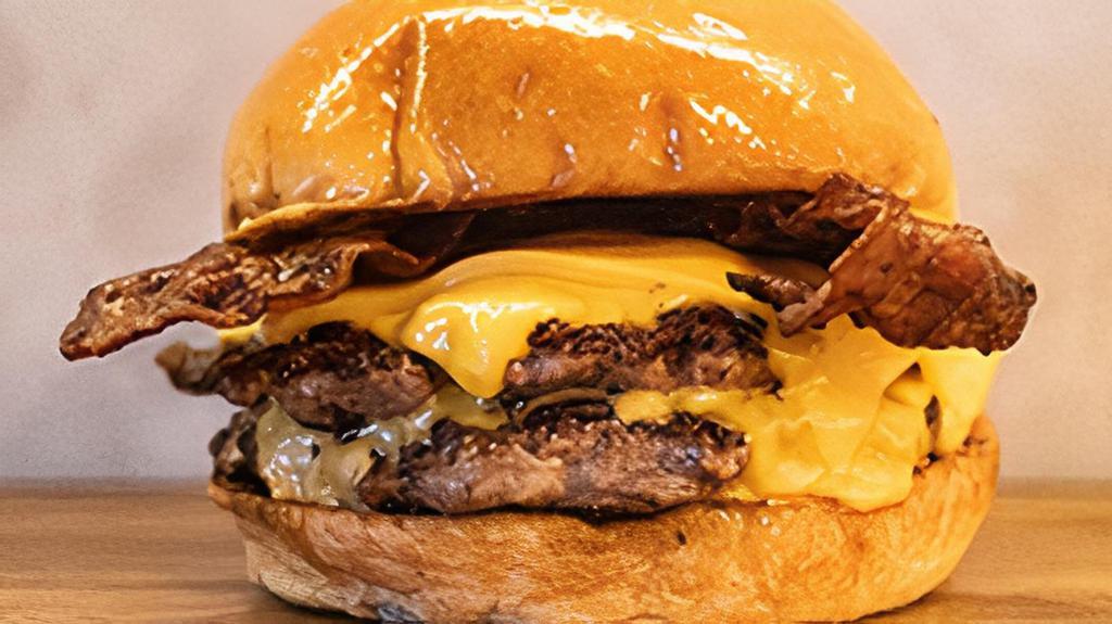 Bacon Cheeseburger Double · Two 4oz beef patties with american cheese and bacon.