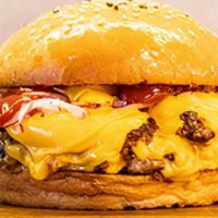 Royale With Cheese · Two 4oz beef patties with american cheese, diced onions, ketchup and yellow mustard.