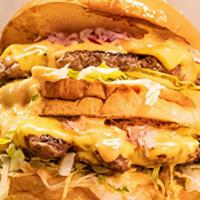 Bm · Our tribute to a classic. Two 4oz beef patties with american cheese, lettuce, thousand islan...