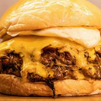 Wisconsin Double · Two 4oz beef patty with american cheese, stewed onion and butter.