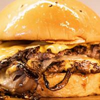 Fried Onion · Two 4oz smashed pattys with american cheese and charred onions.