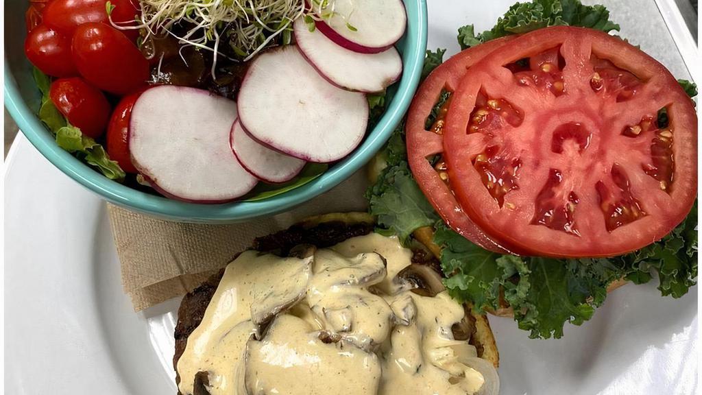 Beyond Burger · Beyond patty, tomato, sauteed onions, sauteed mushrooms, kale and chimi mayo on a bun. Served with oven roasted potatoes, salad, rice or black beans.