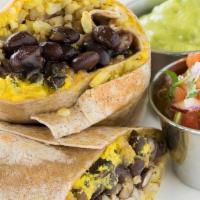 Black Bean & Brown Rice Burrito · Brown rice, black beans and homemade cashew cheese sauce, on whole wheat tortilla wrap; serv...