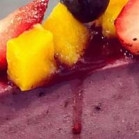 Raw Berries Cashew Cheesecake (Gf) · Homemade cheesecake in a walnut and dates base, garnished with fresh berries, mango and raw ...