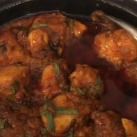 Chicken Chilli Masala · Boneless pieces of chicken cooed with green chilies cooked in onion and dice tomatoes thick ...