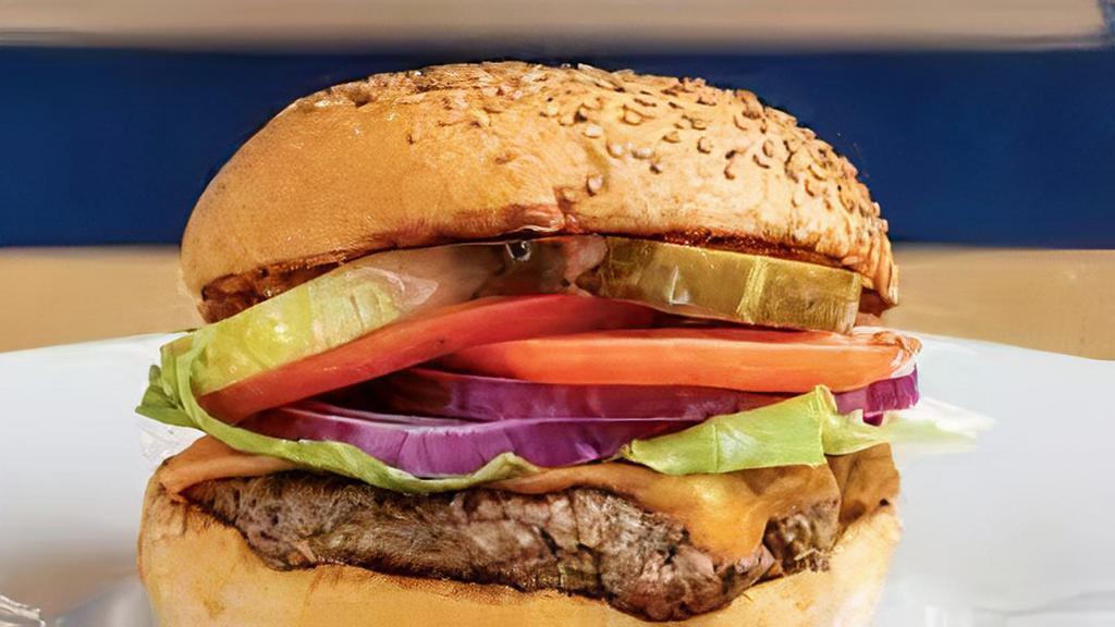 Johnny'S Burger & Choice Of Appetizers · Burger has lettuce, tomato, onions, ketchup, mayonnaise, pink mustard, pineapple sauce, chips. Includes French fries. Served with choice of appetizers.
