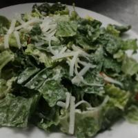 Caesar Salad · Romaine lettuce, Parmesan Cheese, Homemade Croutons & House Caesar Dressing.