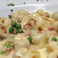 Fazzoletti · Our signature dish. Bite sized gourmet pasta filled with fontina cheese and prosciutto in a ...