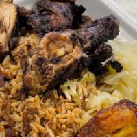 Brown Stew Chicken · Served with rice or rice and peas, and vegetable.