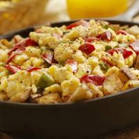 Veggie Skillet · Mushrooms, onions, tomato, green peppers, corn & broccoli, skillet potatoes, topped with che...