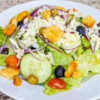 House Salad · Fresh mixed greens, tomatoes, cucumbers, mixed olives, red onions, croutons and mozzarella c...
