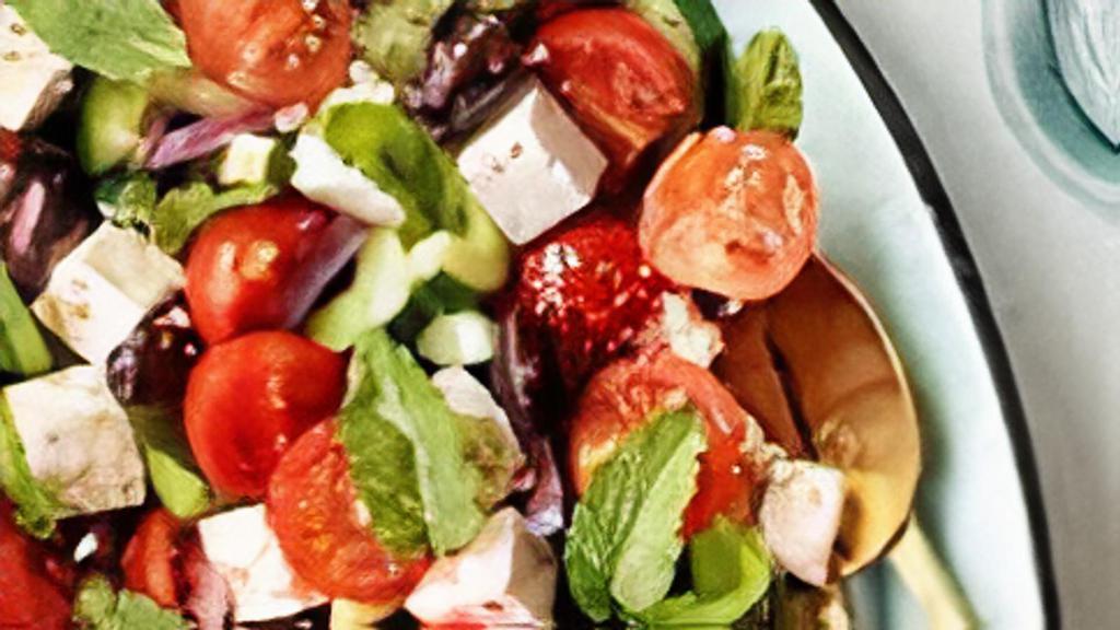 Greek Salad · Lettuce, tomato, cucumber, onion, black olives, and feta cheese.