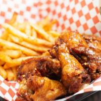 Chicken Wings · Served with fries
