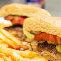 Paradise Burger · Lettuce, tomato, onion, pickle, served with fries.