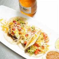 El Jefe Tacos · Served with lettuce, cheese,tomato, soft tortilla, sour cream.