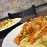 Tomato Basil Penne With Chicken · Pasta mixed with homemade red tomato basil sauce