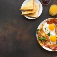 American Breakfast · 2 eggs your choice bacon, ham, turkey sausage, or chicken served with toast, or biscuit, one...