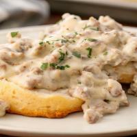 Biscuit & Gravy · 2 fluffy biscuit with southern style gravy.