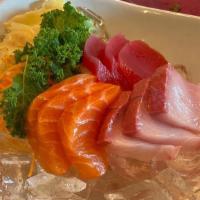 Sashimi Appetizer (9 Pcs) · Sliced salmon, tuna, and yellowtail.