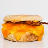 English Muffin, Bacon, Egg, & Cheddar · 2 scrambled eggs, melted Cheddar cheese, smoked bacon, and Sriracha aioli on a toasted Engli...