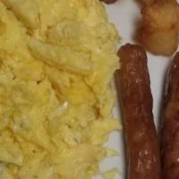 2 Huevos A Su Gusto, 1 Acompañante, Papas · Two eggs any style, one side order and tater tots o grits.