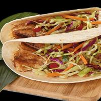 Fried Cod Tacos · Crispy battered cod placed inside a warm tortilla, topped with a crisp creamy slaw and finis...