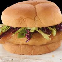 Cod Sandwich · Crispy, battered cod filet served on a warm, toasted sweet bun and topped with a crisp, crea...