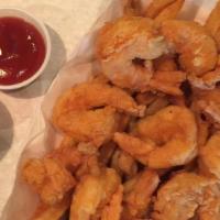 Fried Shrimp Basket · Shrimp is hand-tossed in our homemade butter and fried to perfection, served with a side of ...