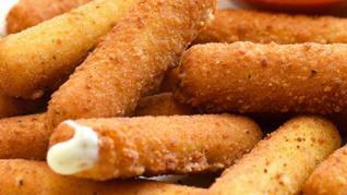 Mozzarella Sticks · Deep fried cheese sticks. Crispy on the outside and gooey on the inside. Served with a side ...