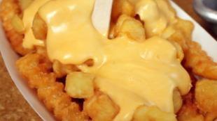 Cheese Fries · Melted cheese over delicious fries.