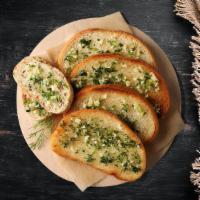 Garlic Bread Galore · Our spin on the traditional garlic bread consists of fresh garlic and butter.