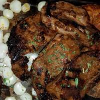 Anticuchos De Corazon · Grilled veal heart kebab.
