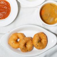 Medhu Vada · Urad dal donuts served with assorted chutneys and sambar.