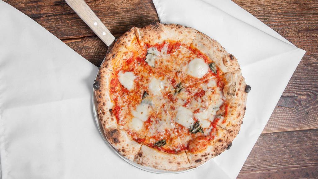 Margherita Red Pizza · Tomato sauce, mozzarella, extra virgin olive oil, and fresh basil.
