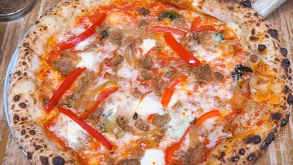 Ammazzare Red Pizza · Tomato sauce, Italian sausage, red bell peppers, caramelized onions, mozzarella, and fresh basil.